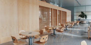 brown wooden pedestal table and chairs