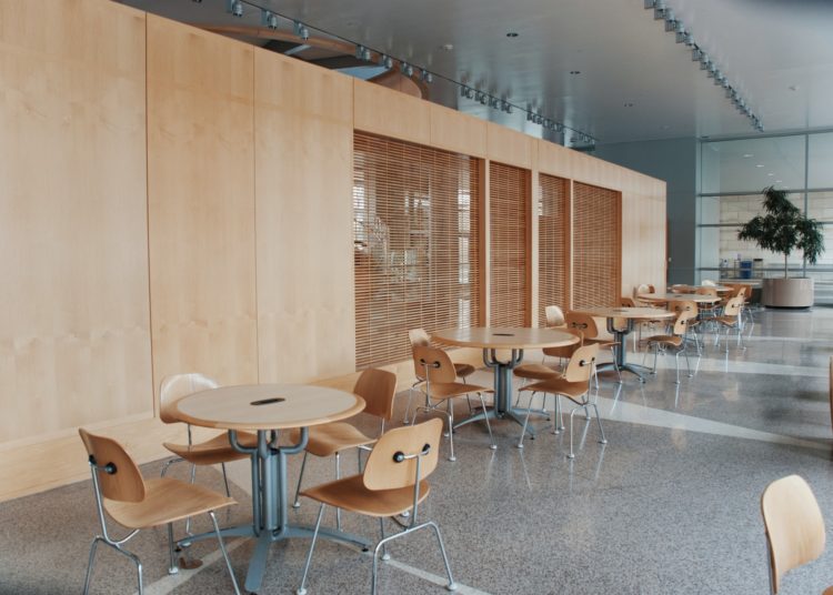 brown wooden pedestal table and chairs