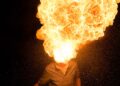man spitting fire